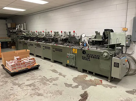 Stitcher, trimmer and inserting machine in the bindery